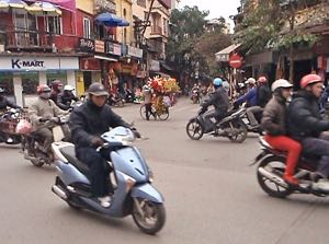 Late afternoon biking in the Old Town of Hanoi, Vietnam